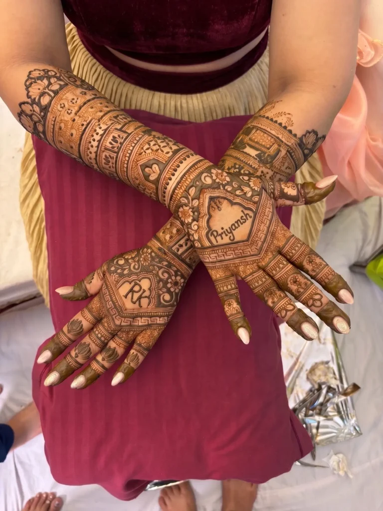 Professional bridal mehndi artist near me creating custom henna designs with the name 'Priyansh' for a wedding in Delhi and Gurgaon.
