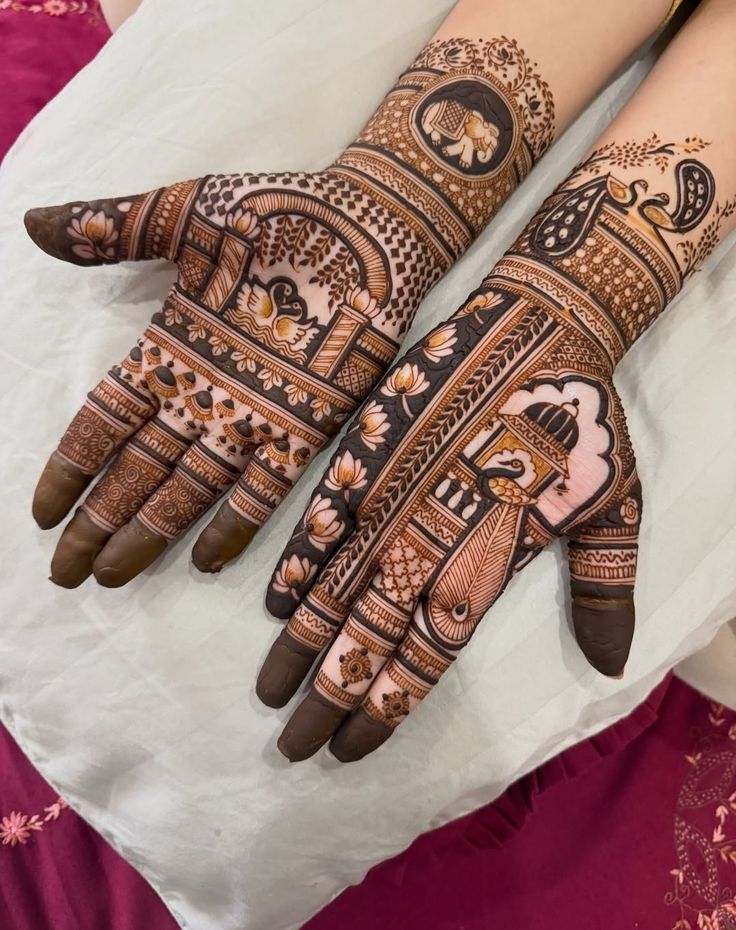 Jewelled engagement mehndi design for bride with gold leaf and rhinestone details.