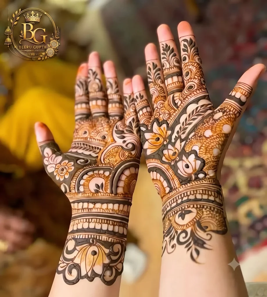 Elegant bridal Arabic mehndi design with flowers and detailed finger patterns.