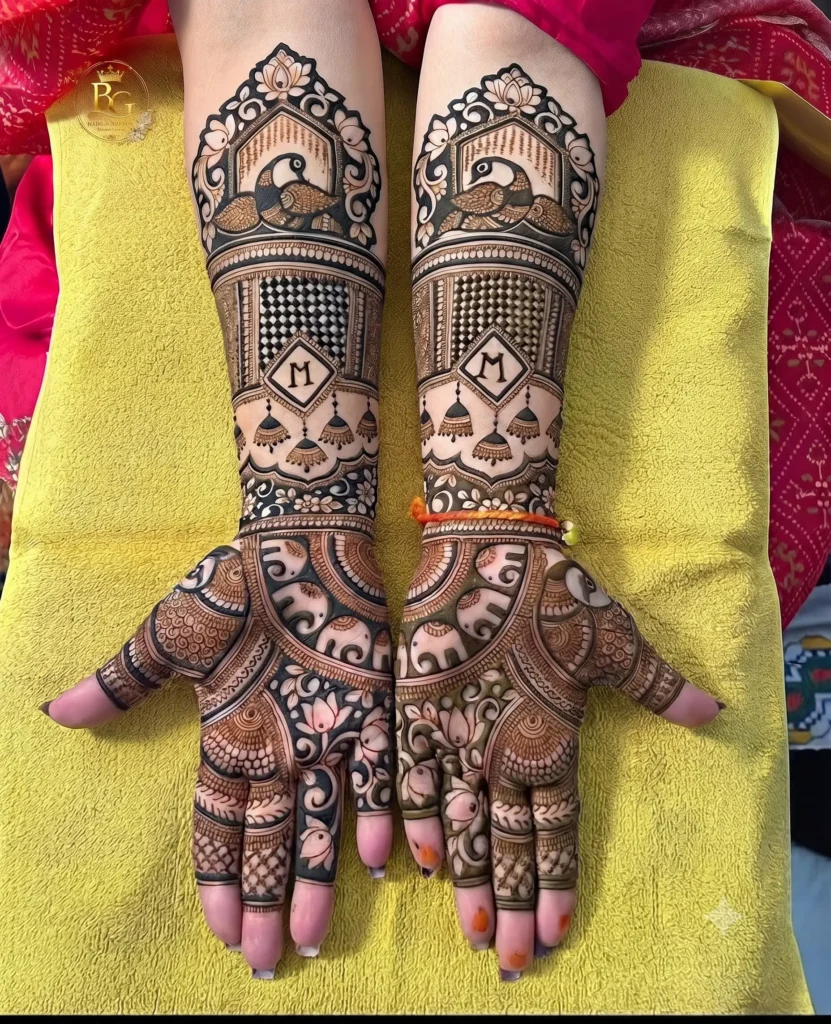 Love bird bridal mehndi design with personalized initial and floral full hand patterns.