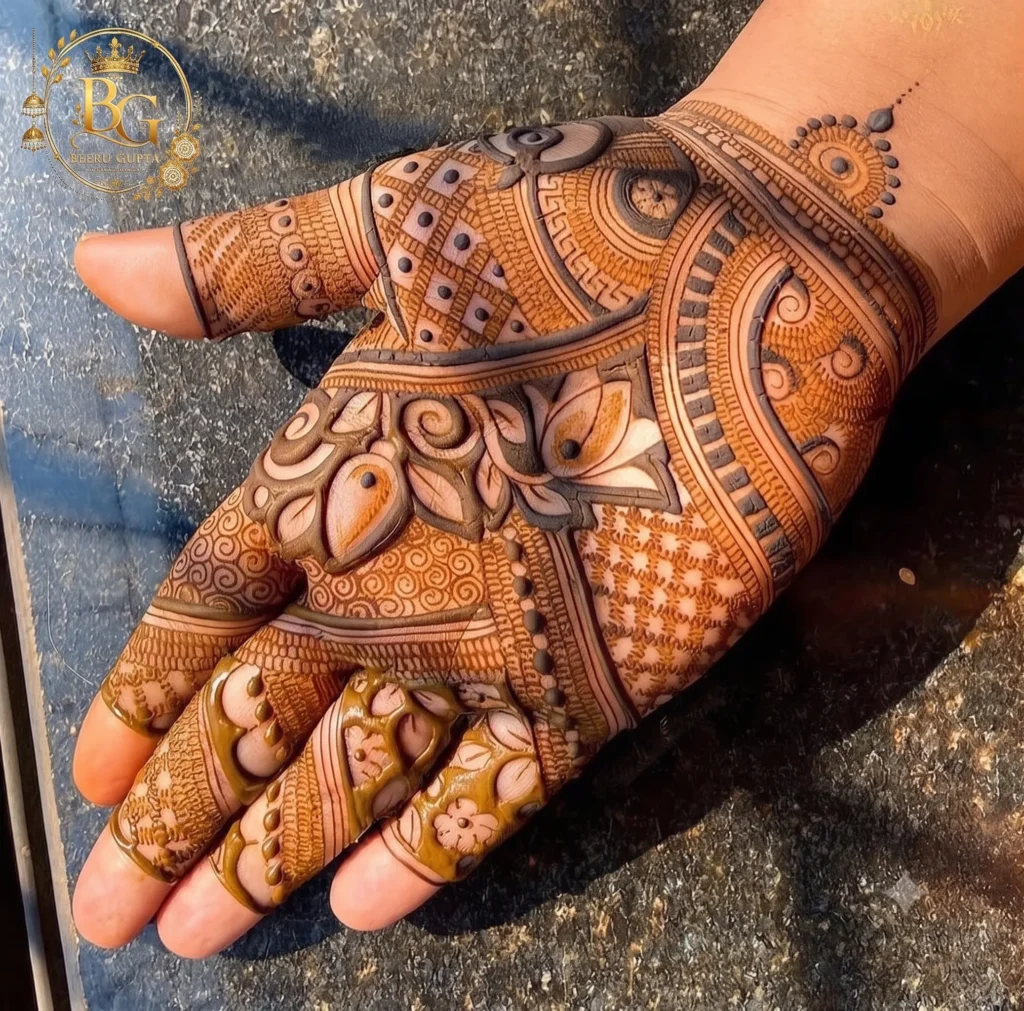 Modern front hand mehndi design with paisley and floral details
