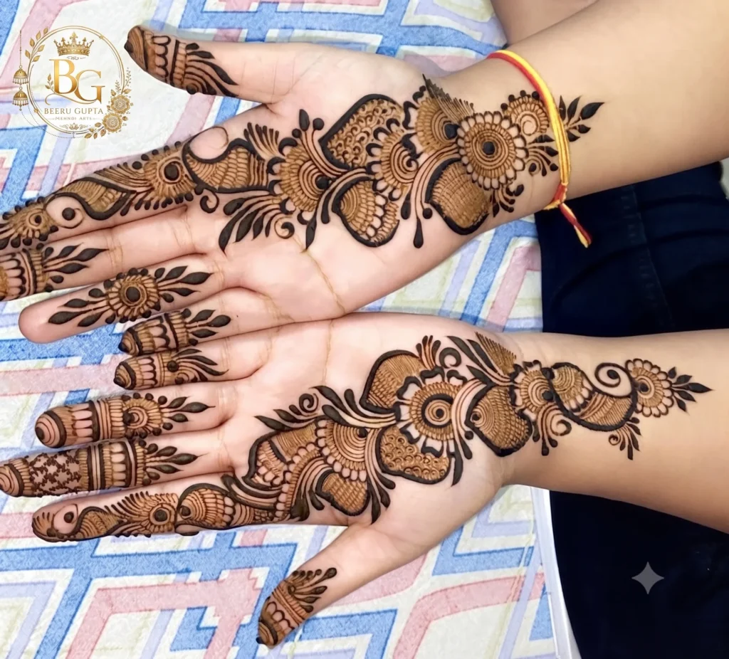 Simple Arabic mehndi design for front hands with floral vine pattern