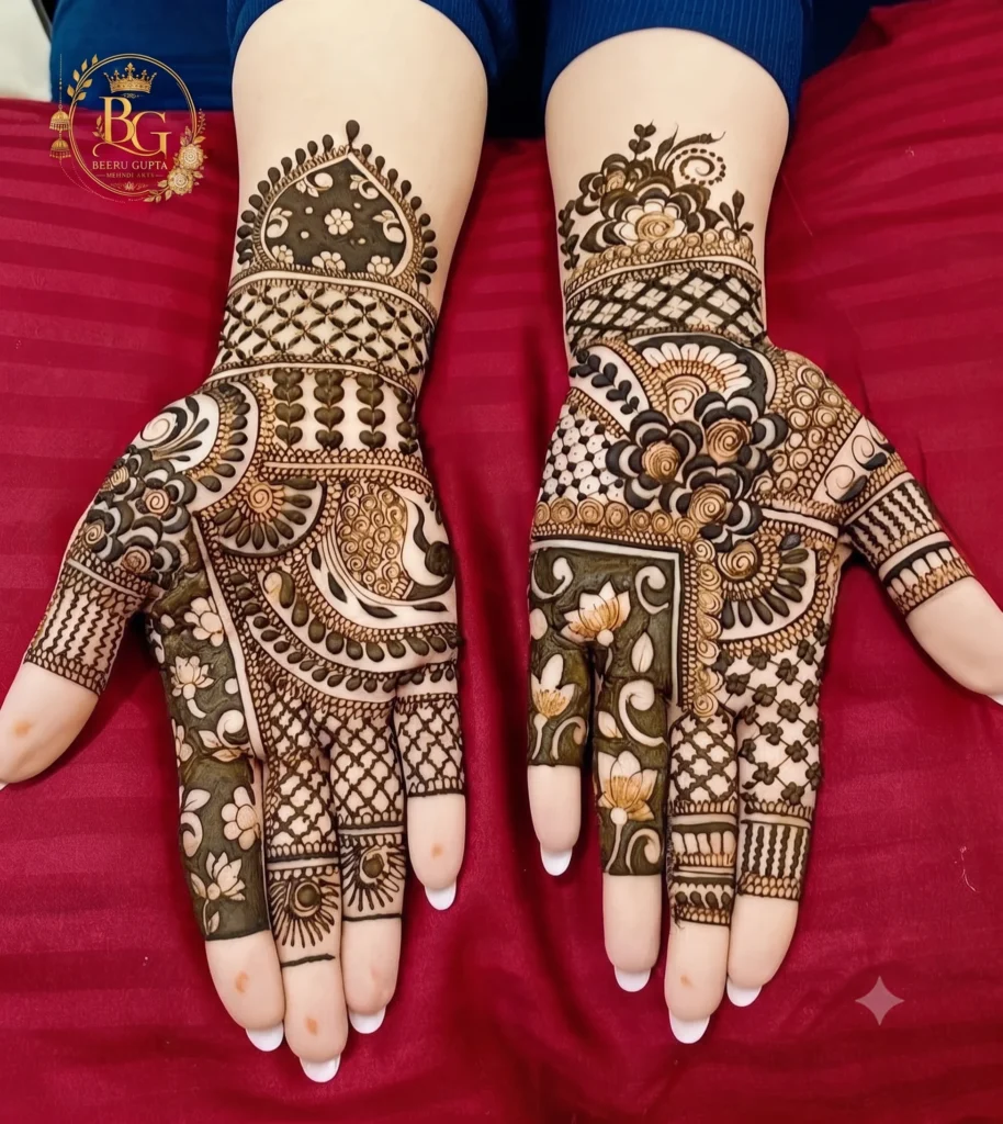 Stylish full hand bridal mehndi design with floral motifs and intricate wedding henna patterns